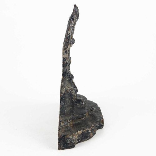 32 - A cast iron doorstop. Height 19.5cm.