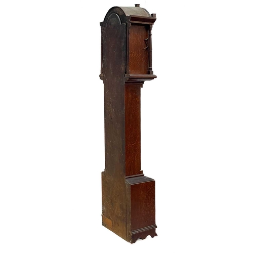 324 - A Victorian eight-day longcase clock. Contained in a scumbled pine case, the arch painted with a hun... 