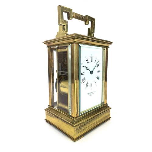 332 - A Goldsmiths and Silversmiths French made repeating carriage clock. Of large proportions, circa 1900... 