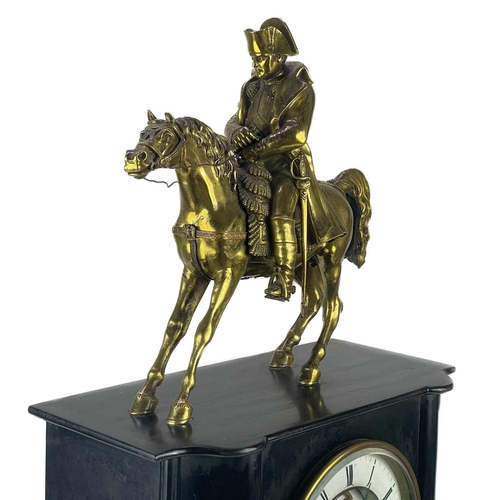 334 - A French black slate perpetual calendar clock surmounted by an ormolu figure of Napoleon. Circa 1880... 