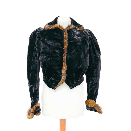 336 - A velvet fur trimmed jacket. Together with a stole and a fur coat.