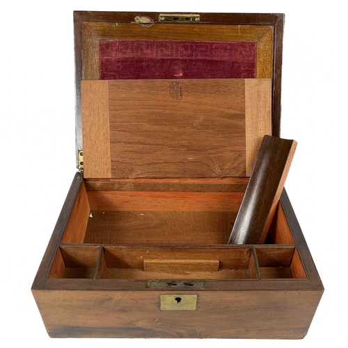 34 - A late 19th century mahogany rectangular writing slope. The lid with inset brass plaque inscribed S.... 