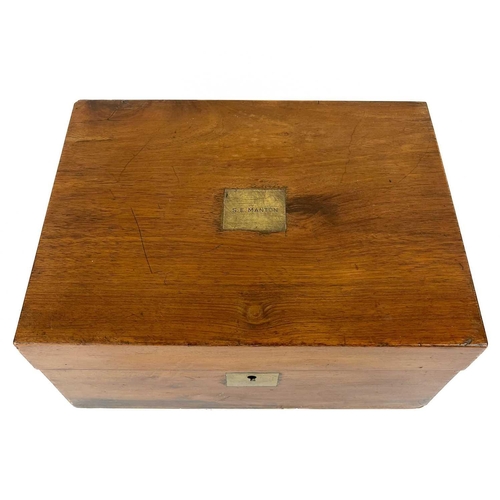 34 - A late 19th century mahogany rectangular writing slope. The lid with inset brass plaque inscribed S.... 