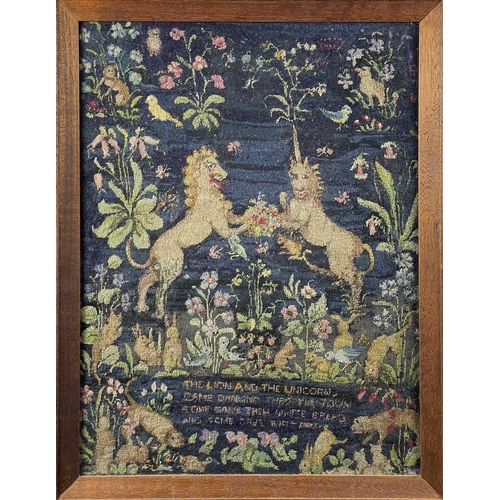 343 - A 20th century needlepoint of a Lion and Unicorn in a garden landscape. 43.5cm x 32.5cm, together wi... 