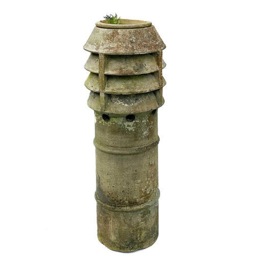 345 - A brass sundial on a reconstituted stone column. Height 82cm together with a tall terracotta chimney... 