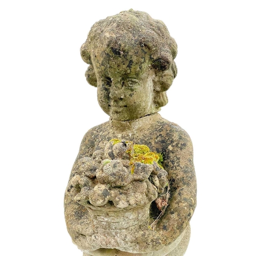 349 - A reconstituted stone figure of Spring. Modelled holding a basket of flowers, height 80cm.