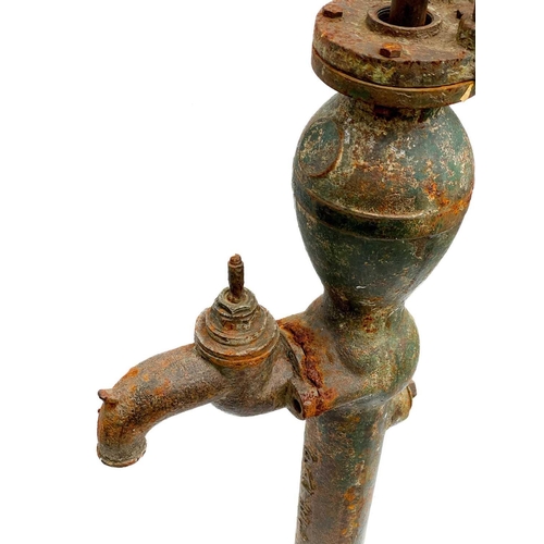 353 - A cast iron village water pump. Height 122cm.