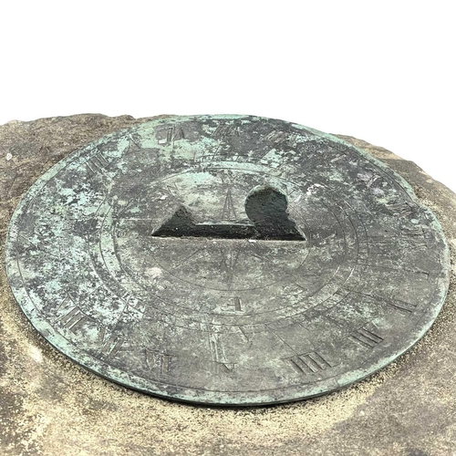 365 - A bronze sundial on a sandstone plinth. The 20.2cm diameter dial signed J Hawley and dated 1794, hei... 