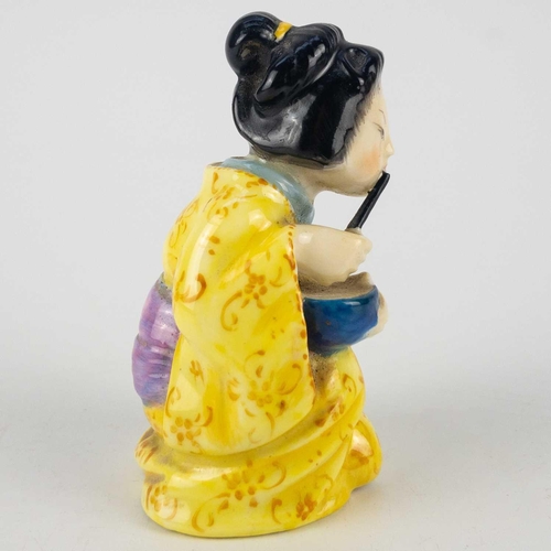 405 - A Royal Worcester candle snuffer, modelled as a Geisha Girl. Printed mark, height 8cm.