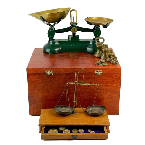 41 - A set of kitchen balance scales. Together with a set of postage scales contained in a Fortnum and ma... 