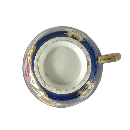 411 - A Worcester blue scale tea cup. Circa 1780, with floral painted panels, together with four assorted ... 