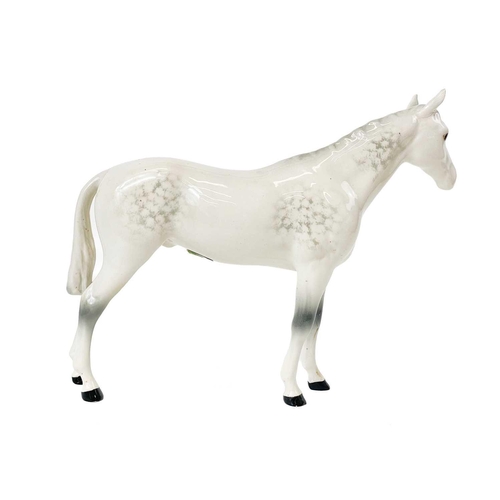 413 - A Beswick Pottery dappled grey horse. Label and stamp marks, height 20.5cm