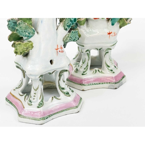 429 - A pair of Samson porcelain figures in Chelsea style. Modelled as a flower girl and companion with ps... 