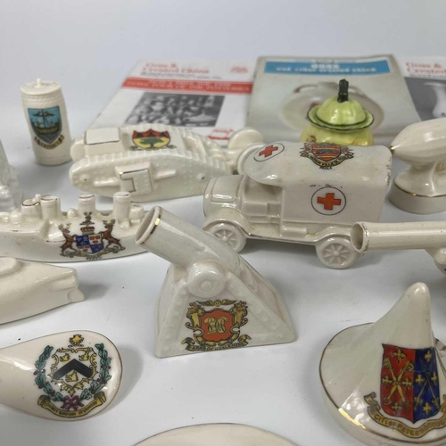 445 - A box of crested china. Including a Swan China airship, a Waterfall China E5 submarine, Arcadian tor... 