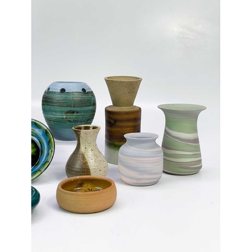 462 - A collection of studio pottery. To include, a studio pottery goblet with brown glaze, a collection o... 