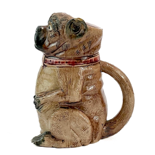 464 - A Continental Majolica pottery seated pug dog jug. circa 1890, height 19cm, together with two Royal ... 