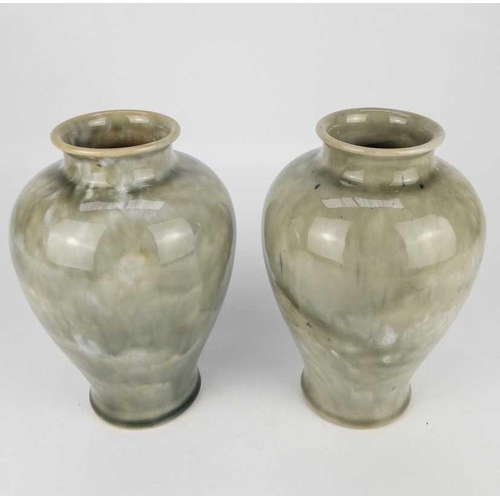 472 - A near pair of Royal Doulton stoneware baluster vases With mottled green glazes, height 19cm, togeth... 