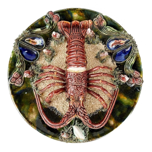 474 - A Portuguese Palissy style lobster dish. Diameter 33cm, together with a large shop display glass dec... 