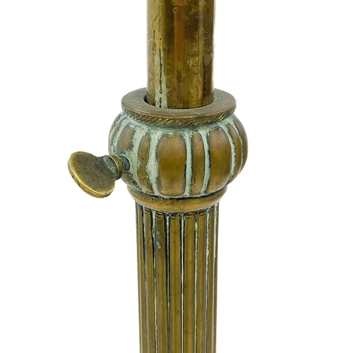 49 - A Victorian brass oil telescopic standard lamp converted to electricity. Height 159cm, together with... 