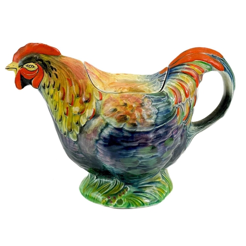 491 - A Wilkinson pottery Indian Summer pattern charger. Diameter 34cm together with a mid century Rooster... 