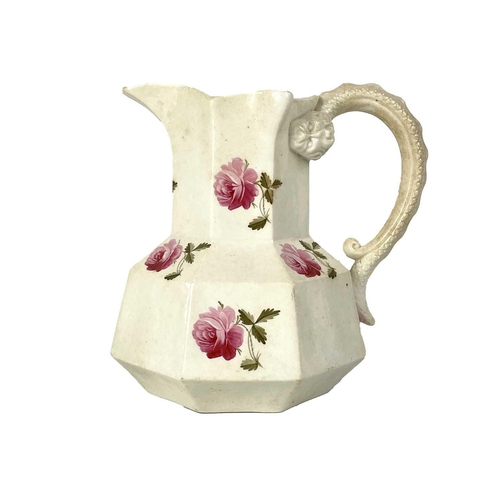 498 - An English porcelain Hydra jug. Circa 1840, painted with full blown roses, height 18cm, together wit... 