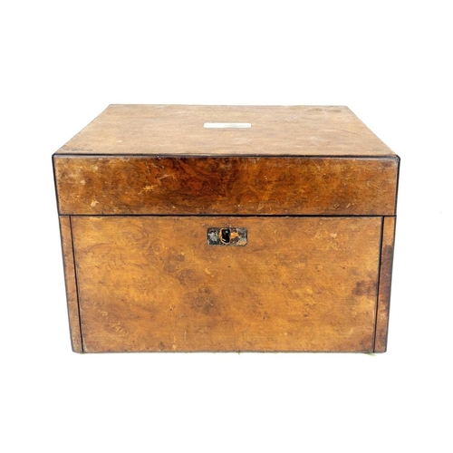 50 - A Victorian burr walnut fitted dressing case. The jars and bottles with plated mounts, the drop-down... 