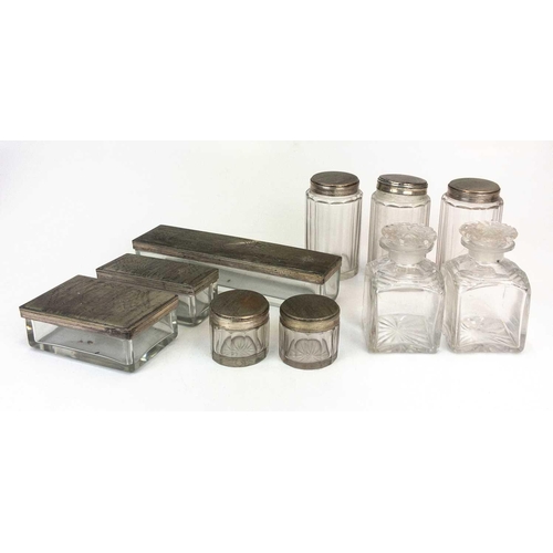 50 - A Victorian burr walnut fitted dressing case. The jars and bottles with plated mounts, the drop-down... 