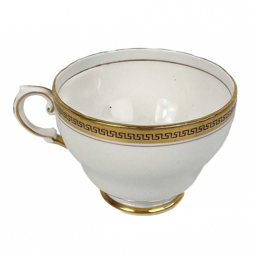 510 - A collection of gilt Greek Key banded coffee and dinnerware. Comprising eight Hammersley cups and sa... 