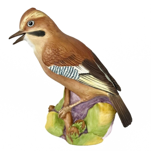 511 - A collection of Goebel Pottery birds. To include a Robin, a Great spotted Woodpecker, a Pheasant, a ... 