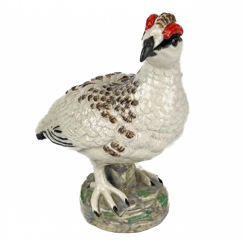 512 - A collection of hand painted ceramic birds. To include a Mack pottery long tailed tit, a classic ros... 