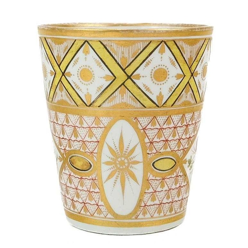 520 - A porcelain beaker. Circa 1790, perhaps Coalport, with a broad yellow and gilt trellis border, above... 