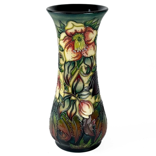 529 - A Moorcroft Pottery Ashwood Hellebore vase by Nicola Slaney. Painters initials H B (Heather Bettany)... 