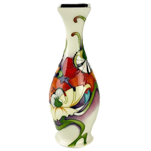 530 - A Moorcroft Pottery Demeter vase by Emma Bossons. M.C.C marks, height 22cm.