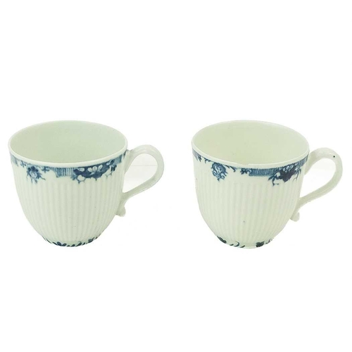 538 - A pair of Worcester underglaze blue Lambrequin pattern tea cups. Circa 1760, with reeded bodies, cre... 