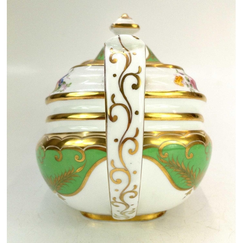 541 - A Ridgway porcelain teapot and cover. Circa 1820, of London shape, the apple green and gilt ground w... 