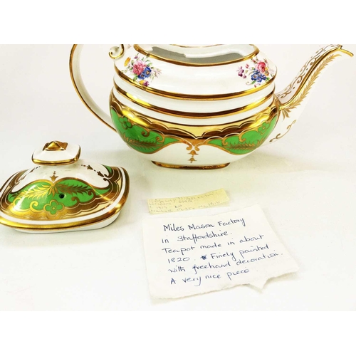 541 - A Ridgway porcelain teapot and cover. Circa 1820, of London shape, the apple green and gilt ground w... 