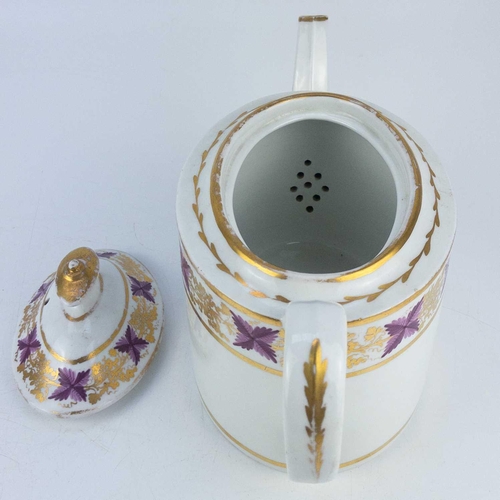 555 - A Coalport Thomas Rose oval porcelain teapot and cover. Circa 1805, decorated in puce and gilt with ... 