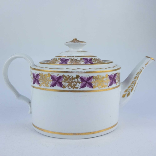 555 - A Coalport Thomas Rose oval porcelain teapot and cover. Circa 1805, decorated in puce and gilt with ... 