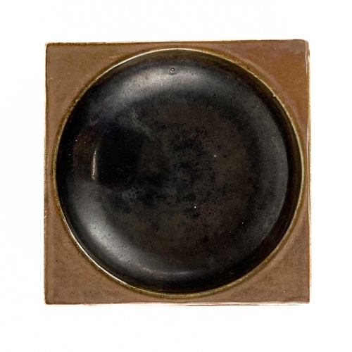 571 - A Troika pottery ashtray. Decorated in varying russet glazes, Penny Black's (active 1960s-1974) init... 