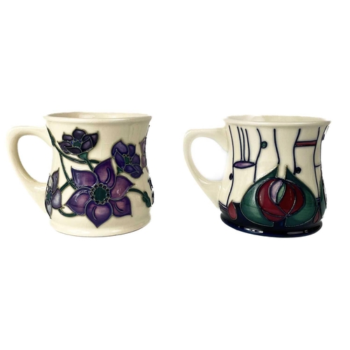 578 - A collection of seven Moorcroft Pottery mugs. Including a Moorcroft Collectors Club 1998 example tog... 