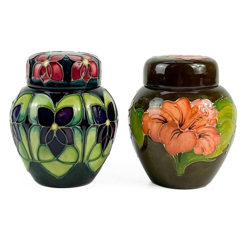 584 - A Moorcroft Pottery Violets ginger jar and cover. Height 11.5cm, together with a Moorcroft Bermuda L... 