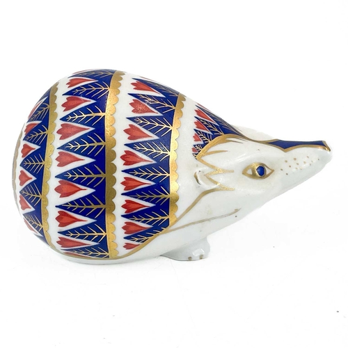 587 - A Royal Crown Derby porcelain Harbour Seal paperweight. With stopper, together with six other Royal ... 