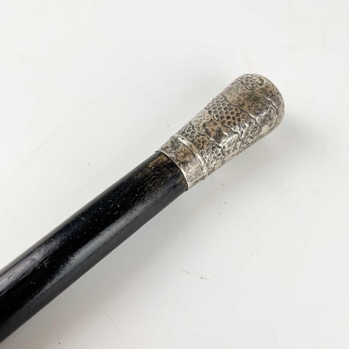 59 - An early 20th century ebonised silver top walking cane. London 1919 hallmarks, length 89cm, together... 