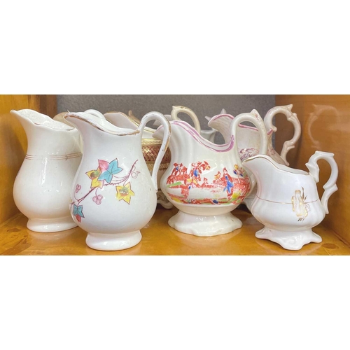 590 - A vast collection of approximately 95 milk and cream jugs. Mainly Victorian, in an array of shapes, ... 