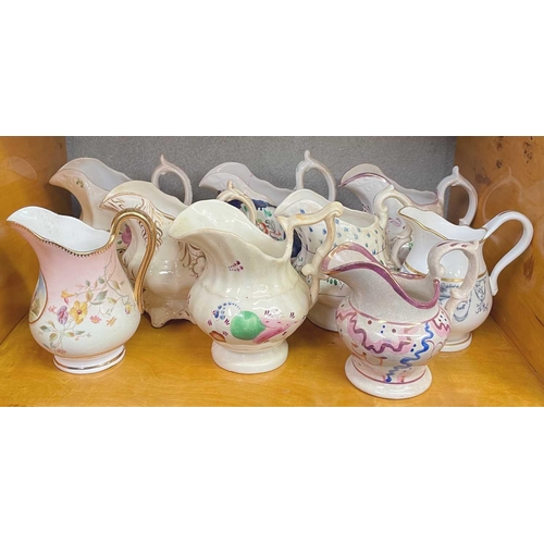 590 - A vast collection of approximately 95 milk and cream jugs. Mainly Victorian, in an array of shapes, ... 