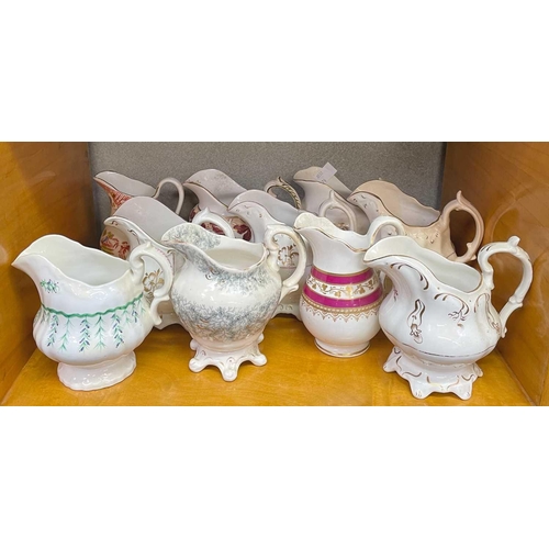 590 - A vast collection of approximately 95 milk and cream jugs. Mainly Victorian, in an array of shapes, ... 