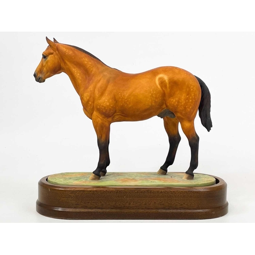 597 - A Royal Worcester porcelain Quarter Horse. With stand and certificate, height 24cm No condition issu... 