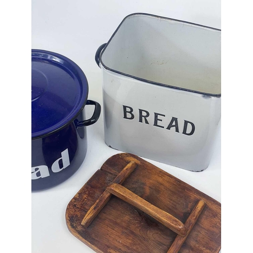 62 - An enamel bread bin with a rustic elm cover. Height 37cm together with another circular enamel bread... 