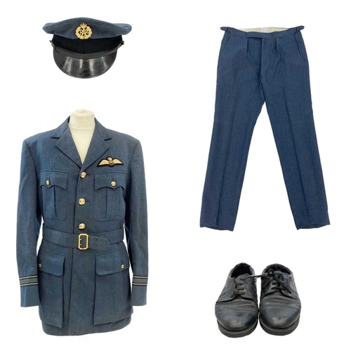 63 - An RAF service uniform. Complete with jacket, trousers, cap and shoes. Inside label to jacket reads ... 