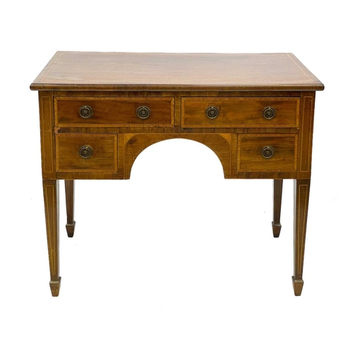 633 - A mahogany and inlaid kneehole side table. Fitted with an arrangement of four drawers, square taper ... 